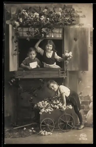Foto-AK Amag Nr. 61765/6: Kinder mit einem Blumenwagen, Glückwunsch zum Namenstag