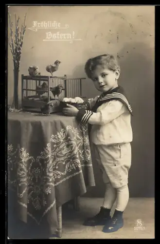 Foto-AK L.J. & F.F. Nr. 507671: Kleiner Junge mit Eierkorb u. Küken, Ostergruss