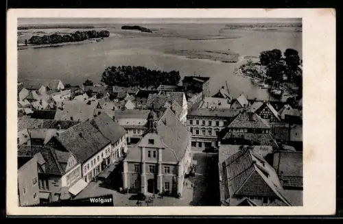 AK Wolgast, Stadtansicht mit Hafen und Peenestrom