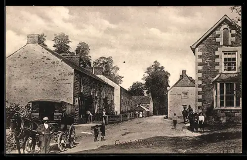 AK Gweek, Dorfstrasse mit Pferdewagen und Personen