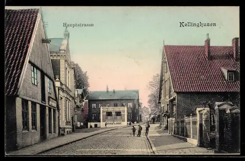 AK Kellinghusen, Hauptstrasse mit Bahnhof-Hôtel und Geschäften