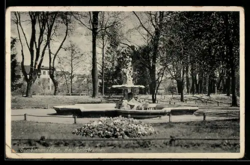 AK Gumbinnen /Ostpr., Partie am Springbrunnen