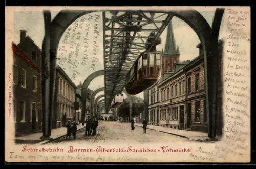 AK Sonnborn, Schwebebahn über der Strasse mit Leuten