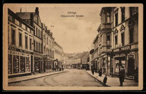 AK Ohligs, Partie in der Düsseldorfer Strasse mit Kaufhaus Th. Guttes und Kronen-Theater