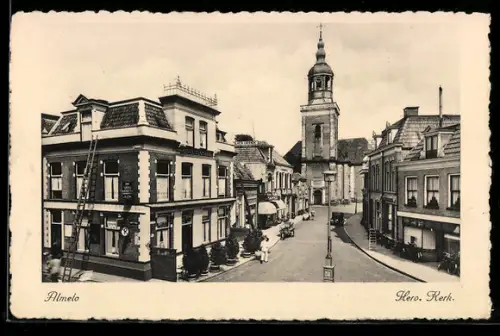 AK Almelo, Herv. Kerk mit Strassenansicht