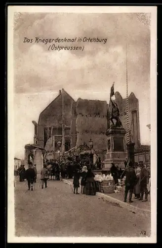 AK Ortelsburg, Strassenpartie mit Ruine und Kriegerdenkmal