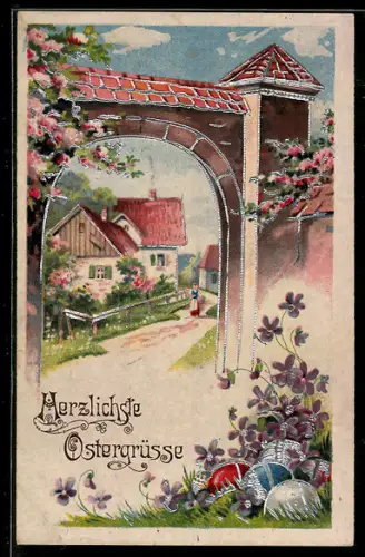 AK Eingang in einen Ort mit Ostereiern und Veilchen, Ostergruss