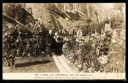 AK Ben My Chree, B.C., Mr. & Mrs. O. H. Partridge in their garden
