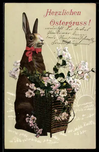 AK Osterhase mit einem Korb voller Blumen, Ostergruss