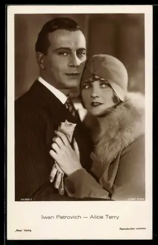 AK Schauspieler Iwan Petrovich und Schauspielerin Alice Terry mit Mütze und Handschuhen