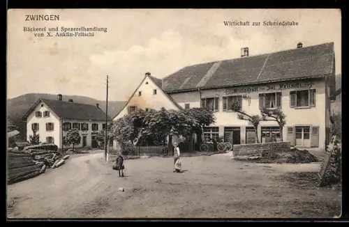 AK Zwingen, Gasthaus zur Schmiedstube v. Jos. Fritschi, Bäckerei und Spezereihandlung von X: Anklin-Fritschi