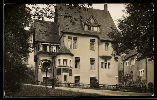 Foto-AK Coburg, Geschäft von Heinrich Steinhäuser in der Alexandrinenstrasse 1