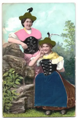 Stoff-Präge-AK Zwei Trachtenmädchen mit blauer Schürze und rosa Schultertuch