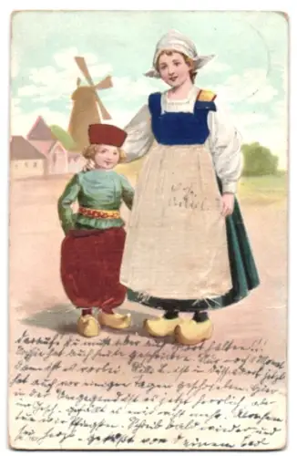 Stoff-Präge-AK Holländisches Trachtenpaar, Pluderhose, Schürze, Windmühle