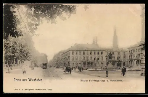 AK Wiesbaden, Kaiser Friedrich Platz & Wilhelmstrasse, mit Strassenbahn & Denkmal