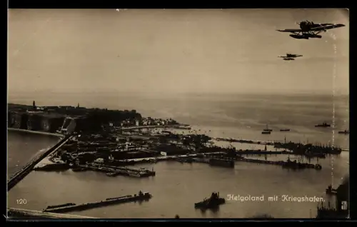 AK Helgoland, Insel mit Kriegshafen, Wasserflugzeuge über der Insel