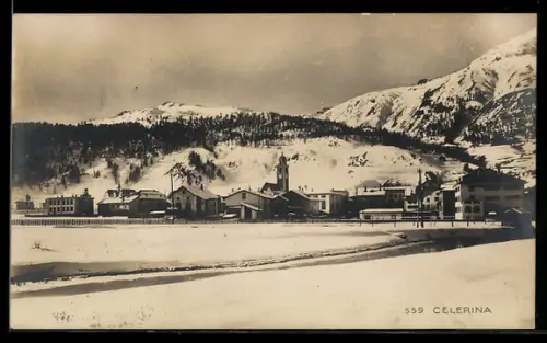 AK Celerina, Ortsansicht mit Kirche im Winter