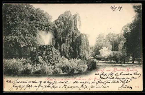 AK Baden-Baden, Partie aus dem Park an der Oos, Springbrunnen, Bäume