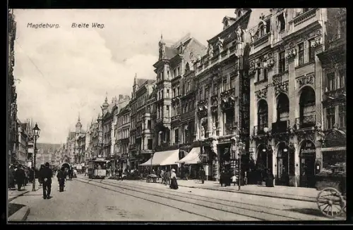 AK Magdeburg, Breite Weg-Strasse mit Geschäften und Strassenbahn