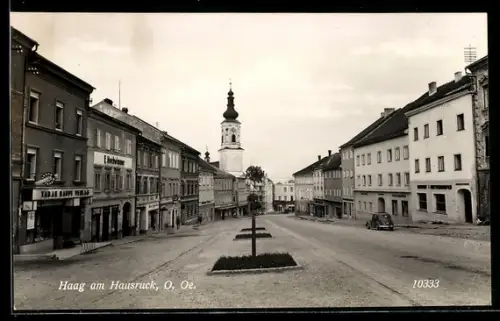 AK Haag am Hausruck, Blick in die Hauptstrasse mit Tabak-Trafik u. Kirche