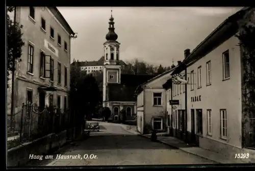 AK Haag am Hausruck, Ortsstrasse mit Kirche und Schloss, Kindergarten, Trafik