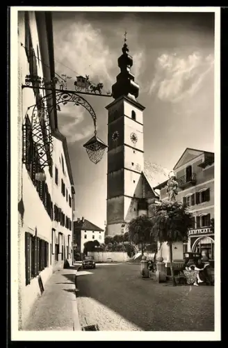 AK Waging a. See, Gasthaus am Marktplatz mit Kirche