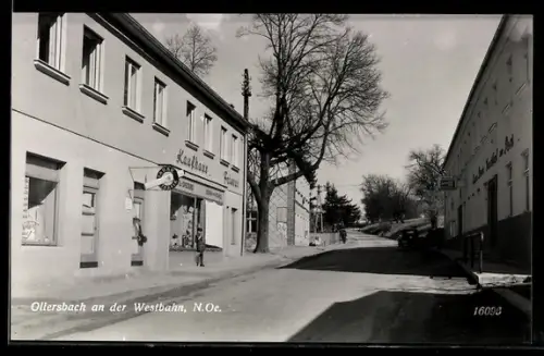 AK Ollersbach an der Westbahn, Ortsansicht mit Strassenpartie am Kaufhaus, Friseur und Gasthaus