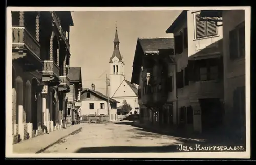 AK Igls, Hauptstrasse mit Kirchturm