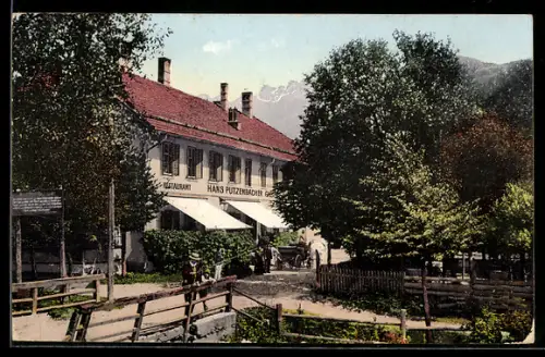 AK Dölsach, Putzenbacher`s Gasthof, Aussenansicht mit Grünanlagen