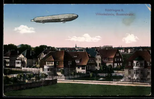 AK Rüstringen, Zeppelin über der Villenkolonie in der Rosenstrasse am frühen Abend