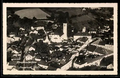 AK Peuerbach /O.-D., Fliegeraufnahme mit Kirche und Ortszentrum