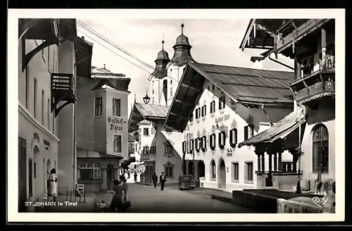 AK St. Johann in Tirol, Strassenpartie mit Gasthof zum Bären, Gasthof Post, Kirche