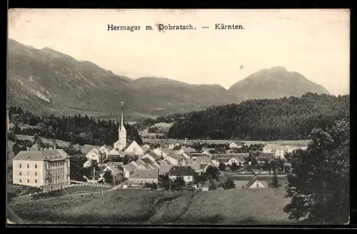 AK Hermagor /Kärnten, Ortsansicht m. Dobratsch, Kirche und Bergpanorama
