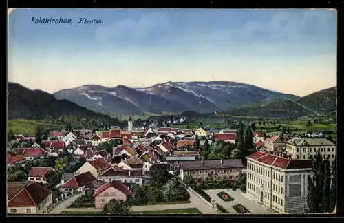 AK Feldkirchen /Kärnten, Totalansicht mit Kirche und Bergen
