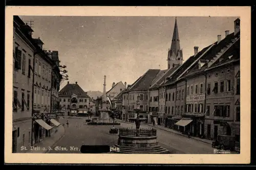 AK St. Veit a. d. Glan, Platz mit Brunnen, Säulendenkmal und Kirche