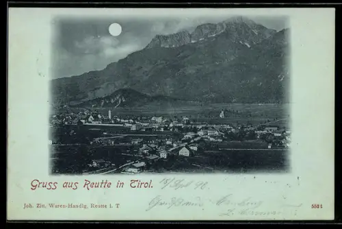 Mondschein-AK Reutte in Tirol, Panorama mit Ort und Gebirgszug