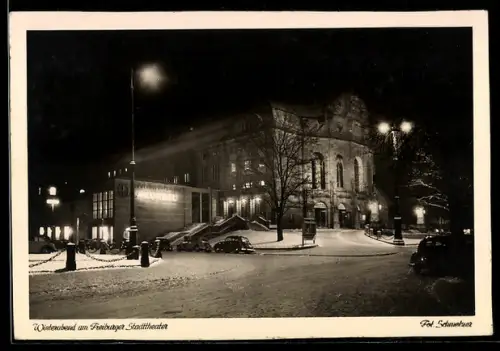AK Freiburg i. B., Winterabend am Stadttheater