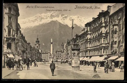 AK Innsbruck /Tirol, Maria-Theresien-Strasse mit Denkmal und Bergpanorama