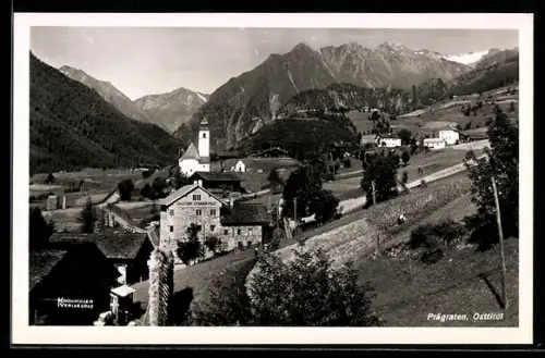 AK Prägraten /Osttirol, Dorfpanorama mit Kirche und Bergkulisse