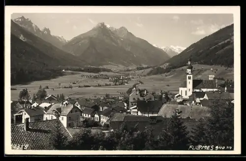 AK Fulpmes, Ortsansicht mit Kirche und Gebirgspanorama