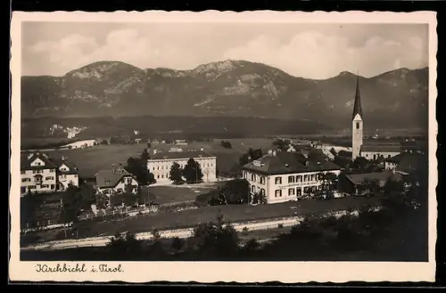 AK Kirchbichl i. Tirol, Strassenpartie mit Kirche
