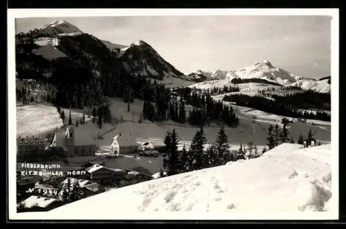 AK Fieberbrunn, Kitzbüheler Horn, Panorama mit Kirche und Ort im Schnee