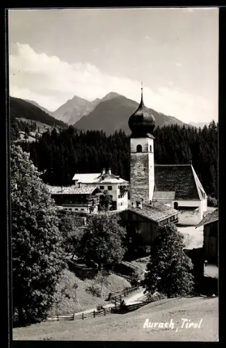 AK Aurach /Tirol, Kirche vor Bergpanorama