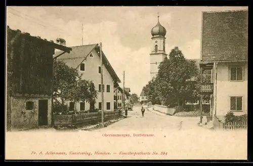 AK Oberammergau, Dorfstrasse mit Kirchturm