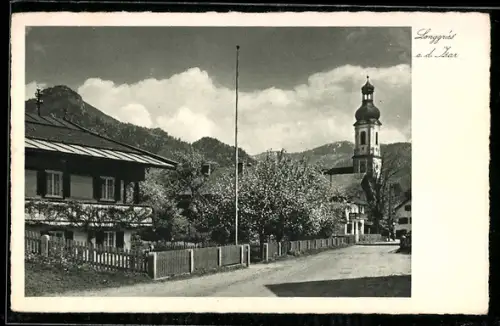 AK Lenggries a. d. Isar, Tölzerstrasse mit Kirche