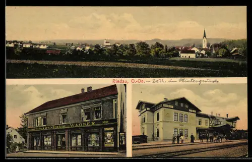 AK Riedau /O.-Oe., Totalansicht mit Kirche, Bahnhof und Warenhaus Wagner