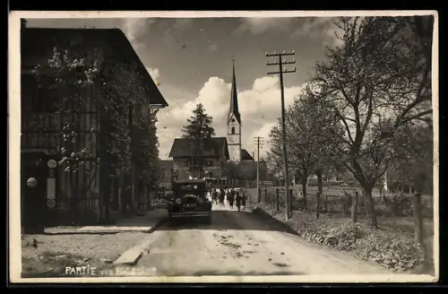 AK Eggstädt, Strasse mit Kirchturm