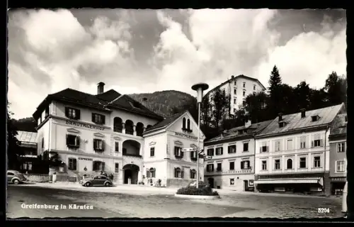 AK Greifenburg /Kärnten, Marktplatz mit Gasthof Drautalerhof u. Fleischhauerei