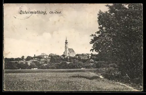AK Ostermiething /Ob.-Oest., Ortspartie mit Kirche