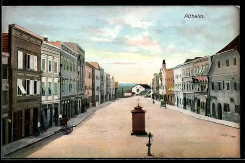 AK Altheim, Hauptstrasse mit Brunnen und Geschäftsbauten